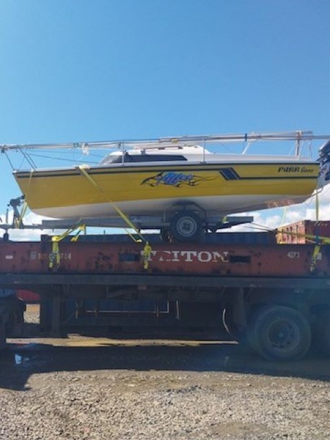 Boat on transporter preparing for export